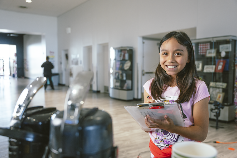 Child Learning how to sell coffee for business program